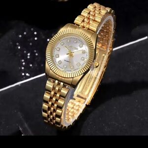 New without tags. Anthropologie Gold Women's Watch. Classic designer look!